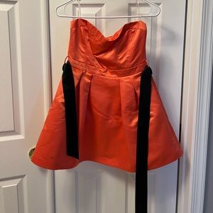 Strapless coral cocktail dress with black belt, size S